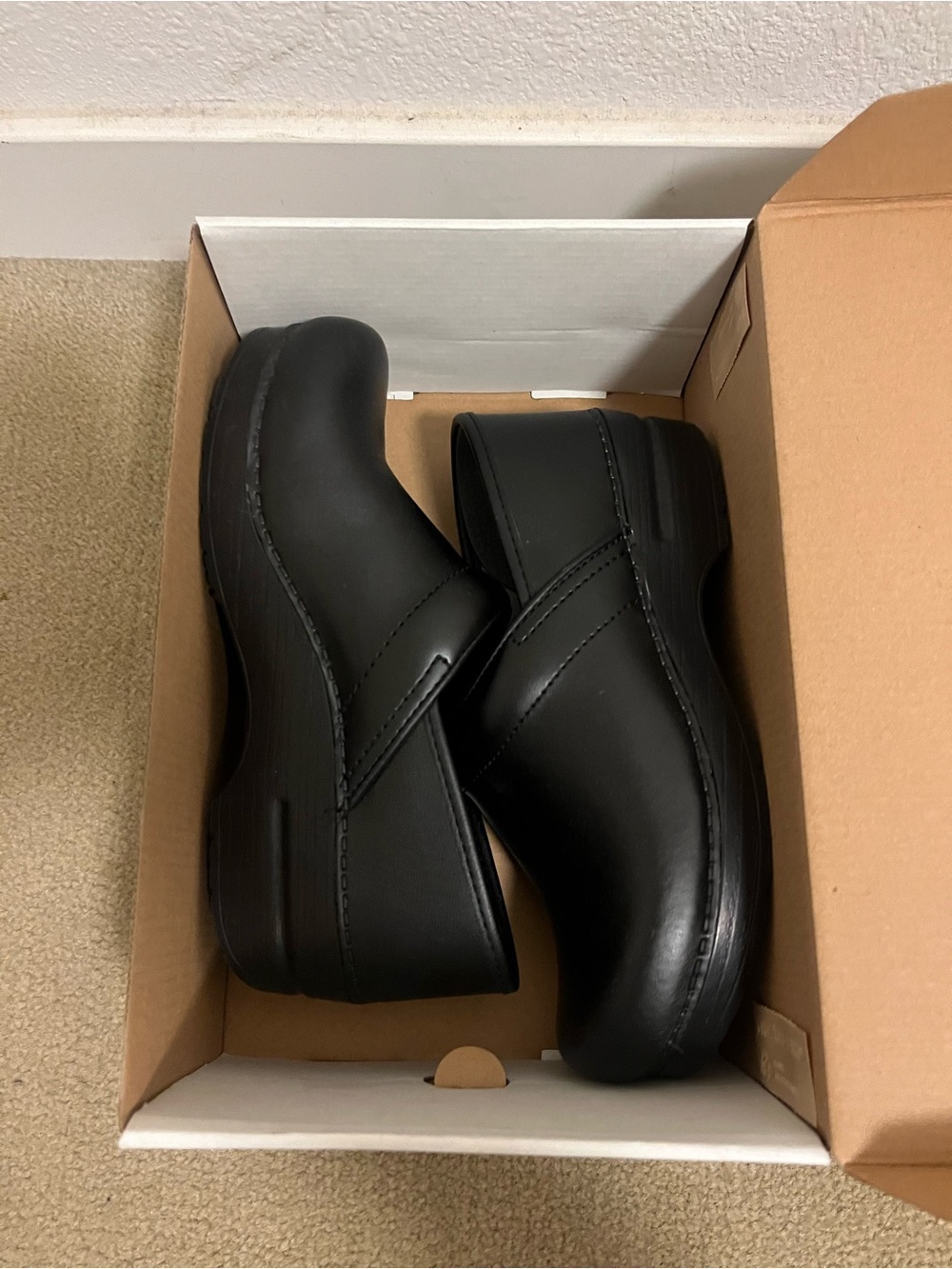 Dansko Black Slip-On Women's Clogs